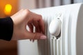 Close-up of young woman adjusting thermostat temperature on radiator. Energy saving mode concept. Generative Ai