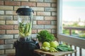 Close up of young woman with blender and green vegetables making detox shake or smoothie at home Royalty Free Stock Photo