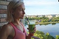 Close up of young woman with detox shake or smoothie at home Royalty Free Stock Photo