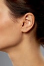 Close up of young woman ear Royalty Free Stock Photo