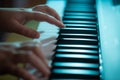 Close up of young woman hands playing on the piano, instrument concept Royalty Free Stock Photo