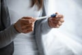 Close up young woman holding plastic pregnancy test in hands Royalty Free Stock Photo