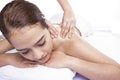 Close-up of a young woman receiving back massage at spa Royalty Free Stock Photo