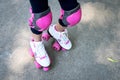 Close up of young woman with roller skating.