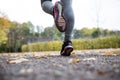 Close up of young woman running in autumn park Royalty Free Stock Photo