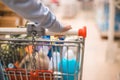 Close up a woman shopping at supermarket.