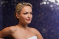 Close up of young woman sitting in bath towel Royalty Free Stock Photo