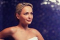 Close up of young woman sitting in bath towel Royalty Free Stock Photo