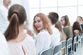 close up. young woman sitting in a row with her associates. Royalty Free Stock Photo