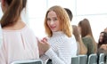 close up. young woman sitting in a row with her associates. Royalty Free Stock Photo