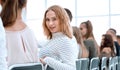 close up. young woman sitting in a row with her associates. Royalty Free Stock Photo