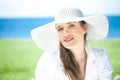 Close-up Of A Young Woman Smiling At The Beach