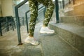 Running in the city sport motivation. Young sporty woman running upstairs on city stairs Royalty Free Stock Photo