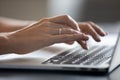 Close up young woman typing message on computer. Royalty Free Stock Photo