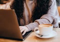 Close up Young woman using laptop at table