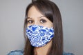 Close up of a Young Woman Wearing Homemade Face, Protective Mask.