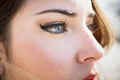 Close-up of young woman's blue eyes with long eyelashes Royalty Free Stock Photo
