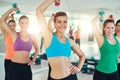 Close-up of young women doing exercise on triceps