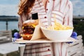 Close up of yummy double meat burger and fries Royalty Free Stock Photo