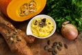 Close-up of a yummy spread of seeds of pumpkin on a wood background