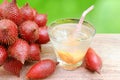 Close up zalacca fruit and zalacca juice in glass.