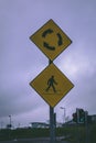 Close up of a zebra crossing and roundabout road signs Royalty Free Stock Photo