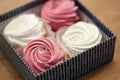 Close up of zephyr or marshmallows in gift box Royalty Free Stock Photo