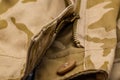 Close up of zipper and button camo pants Royalty Free Stock Photo