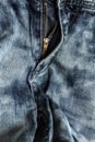 Close-up zipper open on blue jeans, denim texture, zipper jeans pants Royalty Free Stock Photo