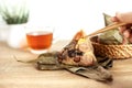 Close up Zongzi or rice dumpling on the wooden table with Chinese tea in Dragon Boat Festival, Asian traditional food Royalty Free Stock Photo