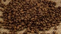 Smooth motion of roasted coffee beans.