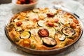 Close-up of Zucchini, tomatoes and cheese tart