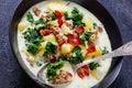 Zuppa Toscana,Tuscan Soup in black bowl, top view Royalty Free Stock Photo