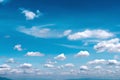 Natural bright blue sky background and white clouds group pattern floating with light wind in summer day Royalty Free Stock Photo