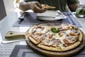 Close ups of traditional Italian ham cheese pizza on wood tray, food and drink concept Royalty Free Stock Photo