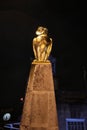 close vertical shot of the golden owl lite up outside the front of Leeds Civic Hall