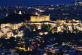 Close view of Acropolis Parthenon and Erechtheion, Philoppapos monument at night. City lights of Athens. Famous iconic