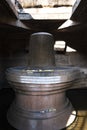 A close view of Badavi Linga Large Shiva Linga in temple vertical frame