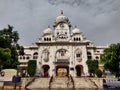 Close view of the white clock tower building (Amritsar, Punjab)