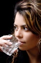 Close view of beautiful woman drinking water Royalty Free Stock Photo