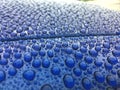 Close view on car paint polished with water drops beading Royalty Free Stock Photo