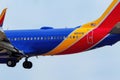 Close view of Boeing 737 operated by Southwest landing at Denver International Airport, Colorado