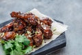 Close view of chicken wings with spicy sauce, copy space Royalty Free Stock Photo