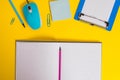 Close view clipboard blank striped paper sheet clip binder pencil markers sticky note computer wire mouse gadget open Royalty Free Stock Photo