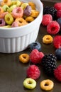 Close View of Colorful Cereal with Raspberries, Blueberries and Blackberries Royalty Free Stock Photo