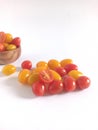 Fresh and shiny Red and Yellow Cherry tomatoes isolated on White Background Royalty Free Stock Photo