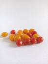 Fresh and shiny Red and Yellow Cherry tomatoes isolated on White Background Royalty Free Stock Photo