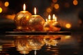 close view of glass balls with candles on a festive background of illumination, bokeh lights, Christmas decoration for New Royalty Free Stock Photo