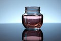 close view of glass cupping jar side on a reflective surface Royalty Free Stock Photo