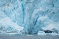 Close view of Holgate Glacier shows deep crevasses and icebergs